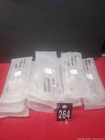 All twelve sealed Haemonetics harness sets laid out