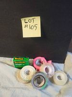 Group shot of all seven tape rolls and boxed Magic Tape