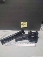 group shot of stapler, two hole punches, ruler