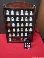 Full view of wood case and thimbles