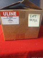 Factory-sealed Uline shipping box with label