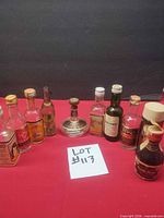 Entire group of miniature liquor bottles on table
