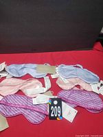 Six Zara Home sleep masks laid out showing colours and tags
