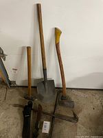 Group shot of all tools on floor and leaning against wall