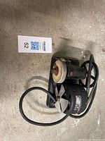 Full view of Hepworth sharpener showing motor, grinding wheel, honing disc, power cord