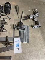 Group view showing riveter, chucks, spindles, square and attachments