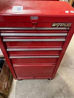 Front view showing drawers, Waterloo M2 logo, and overall condition