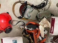 Overall lot showing various PPE items on floor