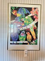 Front view of framed parrot art print on wall