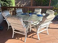 Full view of patio set showing table and six chairs