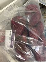 Bag with Malabrigo red-purple yarn hanks