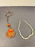 Both necklaces laid out for full view