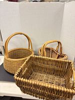 All three wicker baskets grouped together