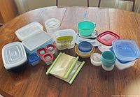 Group shot of all containers and bags arranged on table