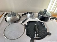 Overall group shot of all cookware pieces laid out