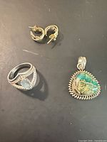 Overview of ring, pendant and hoop earring