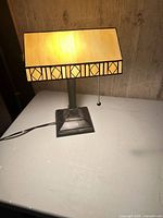 Lamp front view illuminated on tabletop