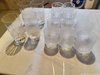 All 14 tumblers grouped on table showing patterns and counts