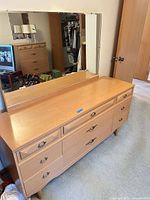 Front view of dresser with mirror attached