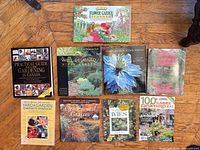 All nine books laid out on floor