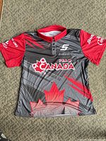 Front view of Snap-On Team Canada polo shirt