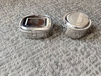 Both stainless steel lunch boxes side by side closed