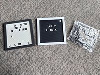 Both letter boards and sealed letter packs on floor