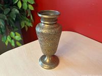 Full view of brass engraved vase