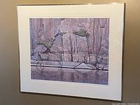 full view of framed print hanging on wall