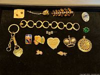 Full layout of all costume jewelry pieces on black background