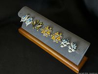 All four pairs displayed on jewellery bar