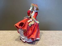 Front view of figurine showing full pose and colours