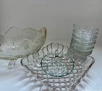 Group shot showing all 10 pressed glass pieces