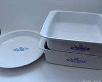 Front view of three white Blue Cornflower baking dishes