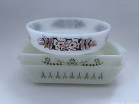 Round "Poppy" bowl stacked on Glasbake and Pyrex bakers