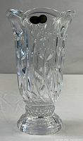 Full view of clear cut crystal vase showing shape and pattern