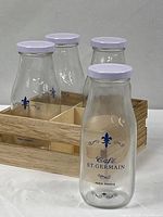 Front view of bottles in crate