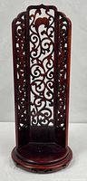 Full view of carved wood stand
