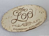 Front view showing inscription and finish