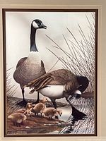 close view of artwork showing geese and goslings