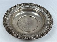 Top view of sterling silver bonbon dish showing overall shape and decorative rim