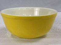 Side view of yellow Pyrex mixing bowl