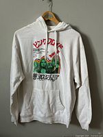 Front view of white Pink Floyd hoodie with Japanese poster graphic