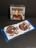 Outer cardboard sleeve front showing title and artwork