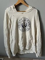 Front view showing graphic, pocket, overall condition