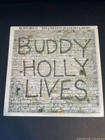 Front cover showing sealed LP Buddy Holly Lives
