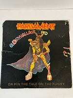 Front jacket showing title graphics and wear on edges