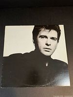 Front sleeve showing portrait cover art