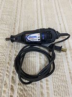 Full view of the Dremel rotary tool with cord