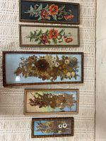 All five framed pieces displayed together vertically